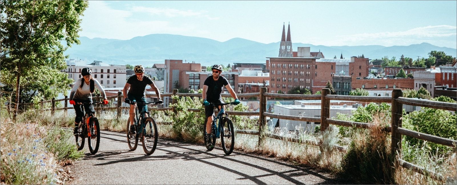 Three bikers on a trail in Helena.